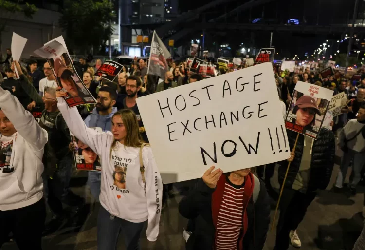Families Of Israeli Captives Decry Netanyahu’s Handling Of Ceasefire Talks 1 Families and supporters of Israeli captives rally outside the Ministry of Defense in Tel Aviv in December.
