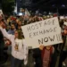 Families and supporters of Israeli captives rally outside the Ministry of Defense in Tel Aviv in December.