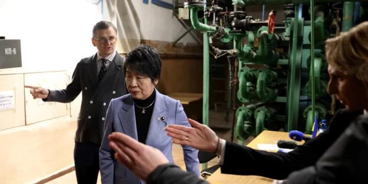 Ukraine's Foreign Minister, Dmytro Kuleba, left, and Japan's Foreign Minister Yoko Kamikawa met with journalists at a Kyiv bomb shelter.