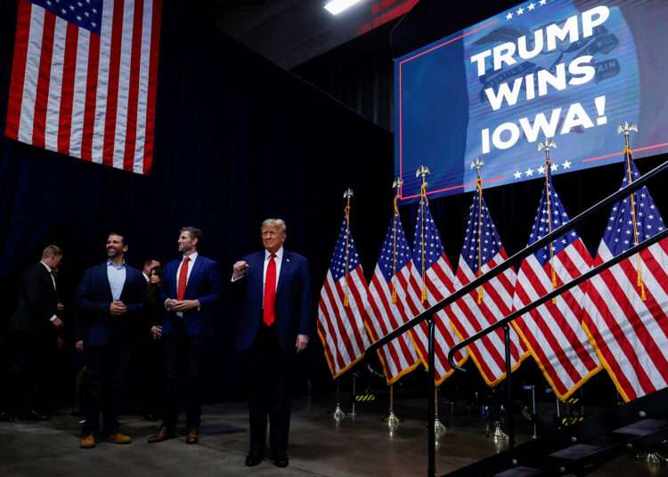 Trump Wins Iowa Republican Caucuses 1 Republican presidential candidate and former U.S. President Donald Trump gestures during his Iowa caucus night watch party in Des Moines, Iowa.