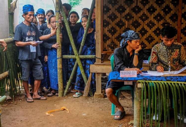 Indonesia Votes For New President 1 ndigenous Baduy people queue to cast their ballots at a general election polling station in Kenekes village, Lebak, Banten.