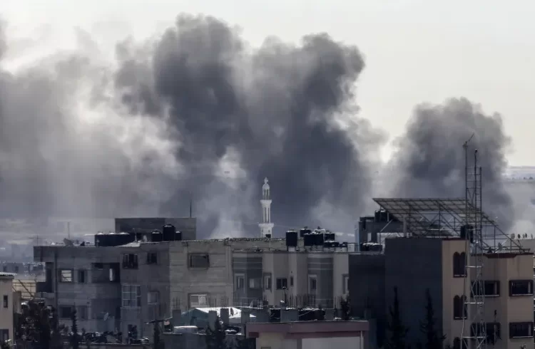 Hamas Official Says Captive Exchange Deal Without Ceasefire Is Unacceptable 1 Smoke rises over residential areas after Israeli attacks on Rafah.