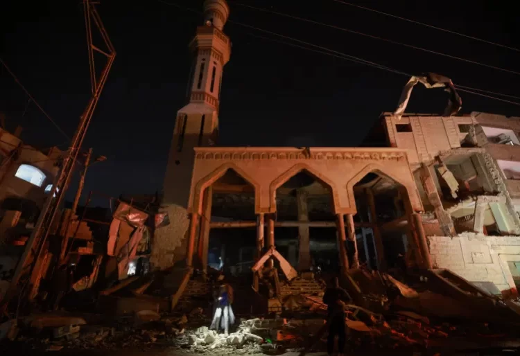 The Already Unfolding Catastrophe Of Epic Proportions Threatens To Exacerbate 1 A destroyed mosque is seen following Israeli bombardments of Rafah in the southern Gaza Strip on Monday morning.