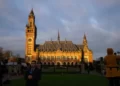 Journalists outside the Peace Palace, housing the ICJ in The Hague.