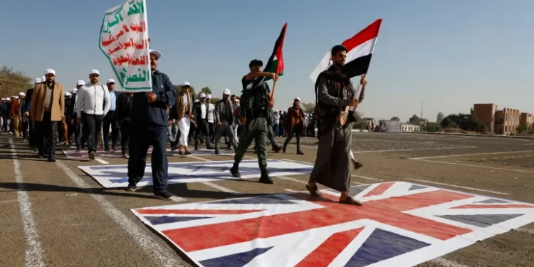 Newly recruited Houthi fighters attend a protest march against the U.S.-led strikes on Yemen and the Israeli war in the Gaza Strip, Wednesday, Feb. 21, 2024, in Sanaa, Yemen.