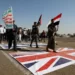 Newly recruited Houthi fighters attend a protest march against the U.S.-led strikes on Yemen and the Israeli war in the Gaza Strip, Wednesday, Feb. 21, 2024, in Sanaa, Yemen.