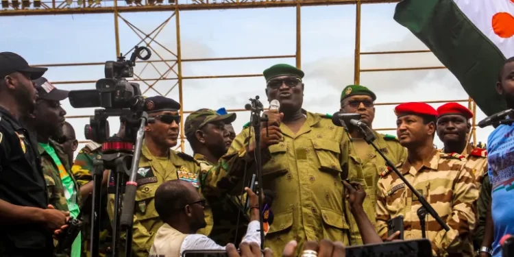 Members of a military council at a stadium in Niamey, Niger