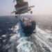 Houthi Attacks In Red Sea Severely Disrupt Aid Flow To Sudan 11 Houthi military helicopter flies over the Galaxy Leader cargo ship in the Red Sea