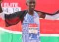 Kelvin Kiptum of kenya celebrates after winning a race.