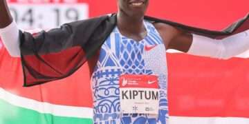 Kelvin Kiptum of kenya celebrates after winning a race.