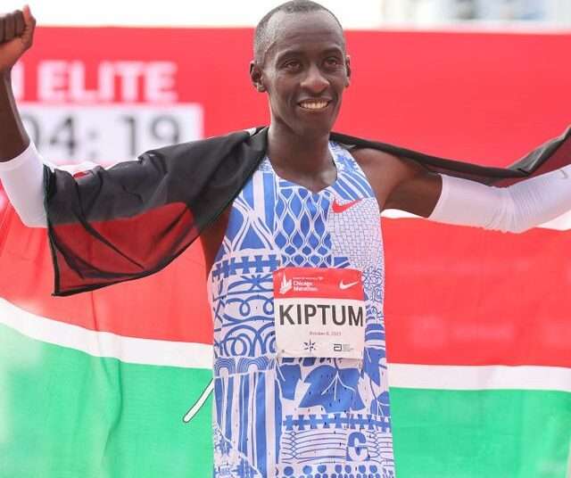 Kelvin Kiptum of kenya celebrates after winning a race.