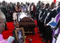 Family members surround the coffin of Kenya's marathon world record holder Kelvin Kiptum