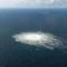 Sweden Concludes Nord Stream Sabotage Inquiry, Passes Evidence to Germany 12 Gas leak at Nord Stream 2 as seen from the Danish F-16 interceptor on Bornholm, Denmark September 27, 2022.
