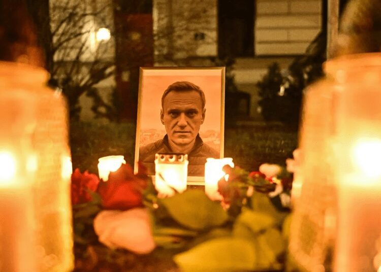 Russia To Bid Navalny Goodbye 1 Framed picture of Alexei Navalny.