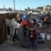 Etemad Assaf, an eight months pregnant, displaced woman, fearful of giving birth to her third child in the desperate conditions she is living in at Gaza.