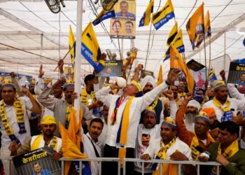 Supporters of India's Aam Aadmi Party at the protest rally against the arrest of Delhi Chief Minister Arvind Kejriwal, at the Ramlila Ground in New Delhi.