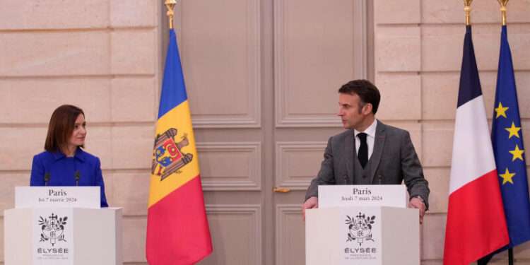 France And Moldova Ink Defence Deal 1 Moldova's President Maia Sandu and France’s President Emmanuel Macron attend a media conference ahead of a working lunch at the Elysee Palace in Paris, March 7, 2024.