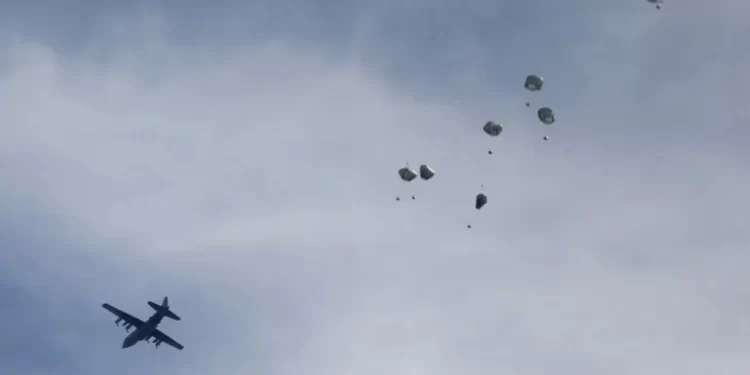 A plane drops aid over Gaza.
