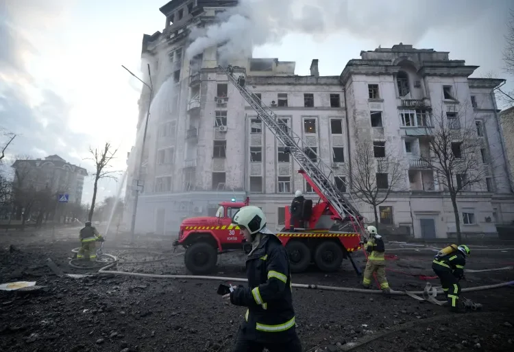 Russia Claims Capture Of Tonenke Village 1 Firefighters work at the site of a building damaged after a Russian attack in Kyiv, Ukraine on Thursday, March 21, 2024.