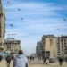 U.S Failing To Use Leverage To Assuage Gaza’s Woes 12 Palestinians run along a street as humanitarian aid is airdropped in Gaza City on Friday.