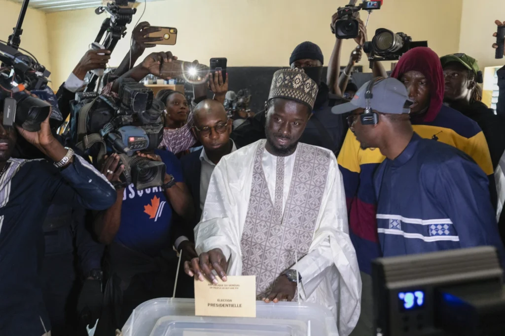 Senegal opposition candidate Bassirou Diomaye Faye casts his vote