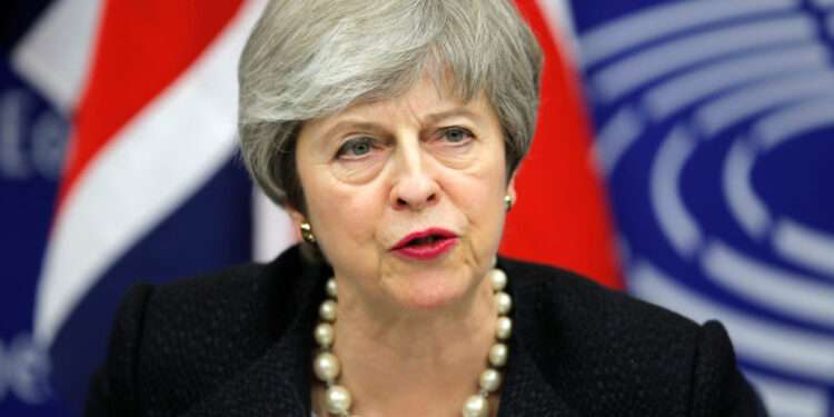 Theresa May Exits Parliament After 27 Years 1 British Prime Minister Theresa May attends a news conference with European Commission