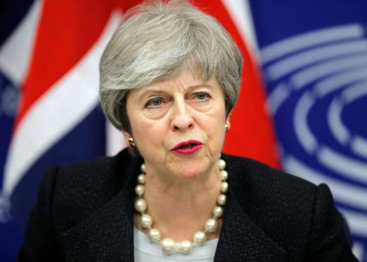 Theresa May Exits Parliament After 27 Years 1 British Prime Minister Theresa May attends a news conference with European Commission