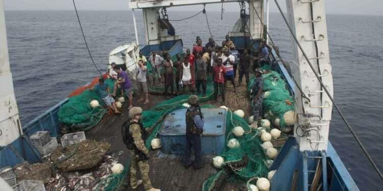 Africa’s Fish Stocks Under Siege By Super-Powers 1 An illegal Chinese fishing trawler