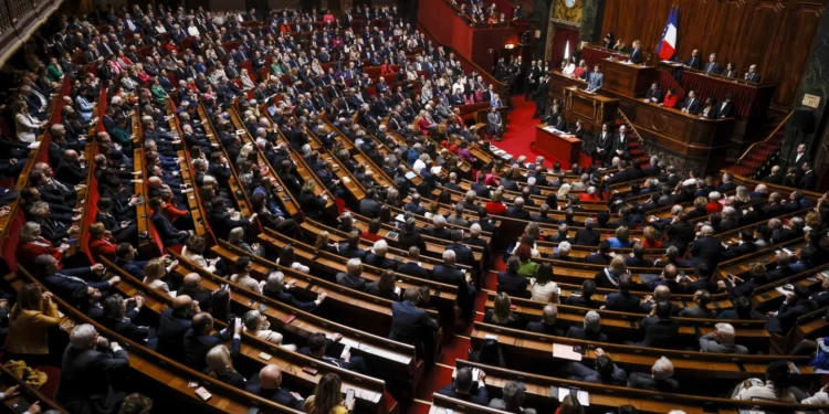 Members of parliament listen to the French Prime Minister, Gabriel Attal in the Palace of Versailles.