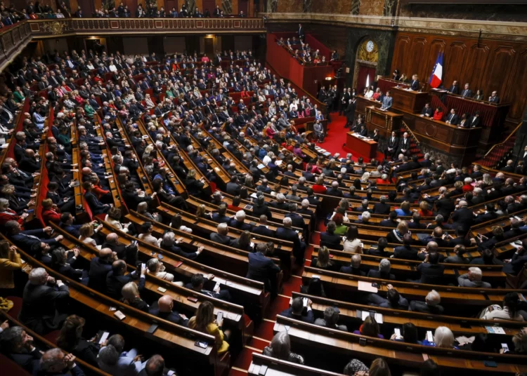 Members of parliament listen to the French Prime Minister, Gabriel Attal in the Palace of Versailles.