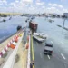 UAE Hit With Heaviest Rainfall In 75 Years 11 Cars are stuck on a flooded road after a rainstorm hit Dubai, United Arab Emirates on Wednesday.
