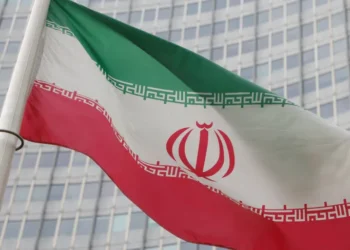 The Iranian flag flutters outside the International Atomic Energy Agency (IAEA) headquarters in Vienna, Austria.