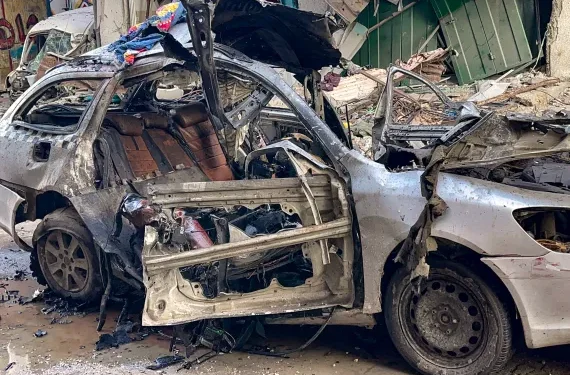 Ceasefire Talks Complicated 1 The car in which three sons of Hamas leader Ismail Haniyeh were reportedly killed in an Israeli air strike is pictured in the Shati camp, west of Gaza City.