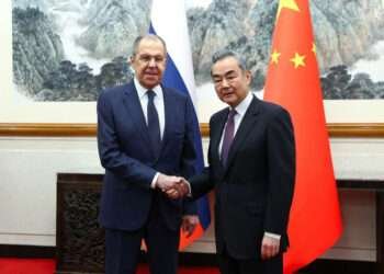 Russia's Foreign Minister Sergei Lavrov shakes hands with China's Foreign Minister Wang Yi during a meeting in Beijing, China April 9, 2024.
