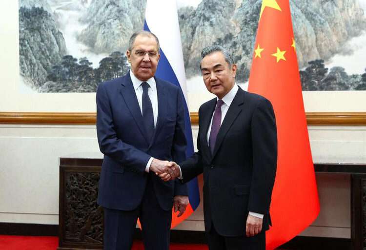 Russia, China To Bolster Security Cooperation In Eurasia 1 Russia's Foreign Minister Sergei Lavrov shakes hands with China's Foreign Minister Wang Yi during a meeting in Beijing, China April 9, 2024.