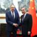 Russia's Foreign Minister Sergei Lavrov shakes hands with China's Foreign Minister Wang Yi during a meeting in Beijing, China April 9, 2024.
