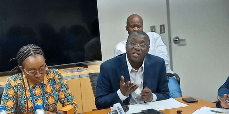 Dr. Mohammed Amin Adam (right)