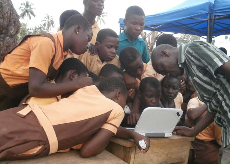 Political Parties Urged to Prioritize ICT Infrastructure 1 Public Basic Students Having hands-on computer classes