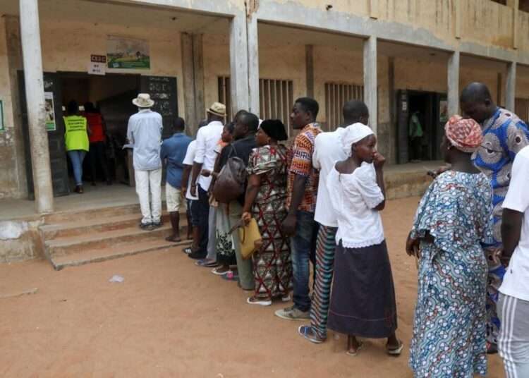 Togo Votes In Controversial Legislative Elections 1 Voters in a queue to cast their vote