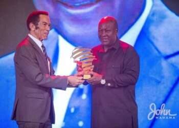 Former President John Dramani Mahama receives his Award