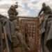 Ukrainian servicemen prepare a trench system in the Donetsk region.