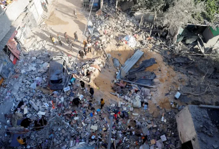 UN Report Finds Both Hamas And Israel Guilty Of War Crimes 1 Aftermath of an Israeli strike on a Rafah home.