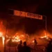 Fire rages following an Israeli strike on a tent camp for displaced Palestinian in Rafah.