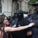 Georgian Parliament Rejects Presidential Veto Of 'Foreign Agent' Bill 12 Demonstrators stand in front of law enforcement officers during a rally to protest against a bill on 'foreign agents', after Georgia's parliament voted to override a presidential veto of the bill, in Tbilisi, Georgia.