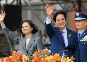 Taiwan's new President, William Lai Ching-te (right) waves alongside outgoing President, Tsai Ing-wen during the inauguration ceremony.