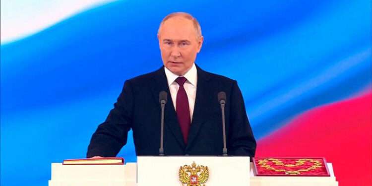 Putin Sworn In For Fifth term 1 Vladimir Putin takes his oath as Russian President during an inauguration ceremony in the Grand Kremlin Palace in Moscow, Russia, Tuesday, May 7, 2024.