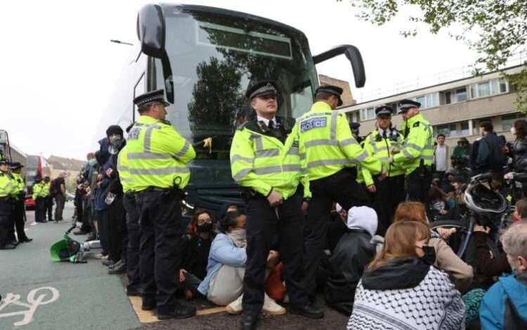 Protesters Halt Asylum Seekers Barge Move in London 1 Protesters block coach taking asylum seekers to Bibby Stockholm in London