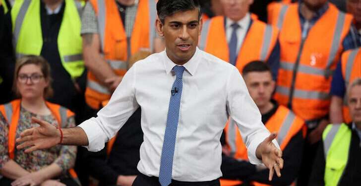 Sunak To Scrap "Rip-Off Degrees" 1 British Prime Minister Rishi Sunak speaks with staff at a transport distribution center in Ilkeston, Britain