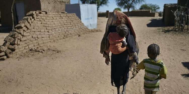 ‘Noose of War’ Tightens on Civilians in Al Fasher, Sudan 1 Children walking to their shelter at an IDP camp near Al Fasher, the capital of North Darfur, Sudan