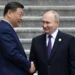 Russia's President Vladimir Putin and China's President Xi Jinping attend an official welcoming ceremony in front of the Great Hall of the People in Tiananmen Square in Beijing on May 16, 2024.